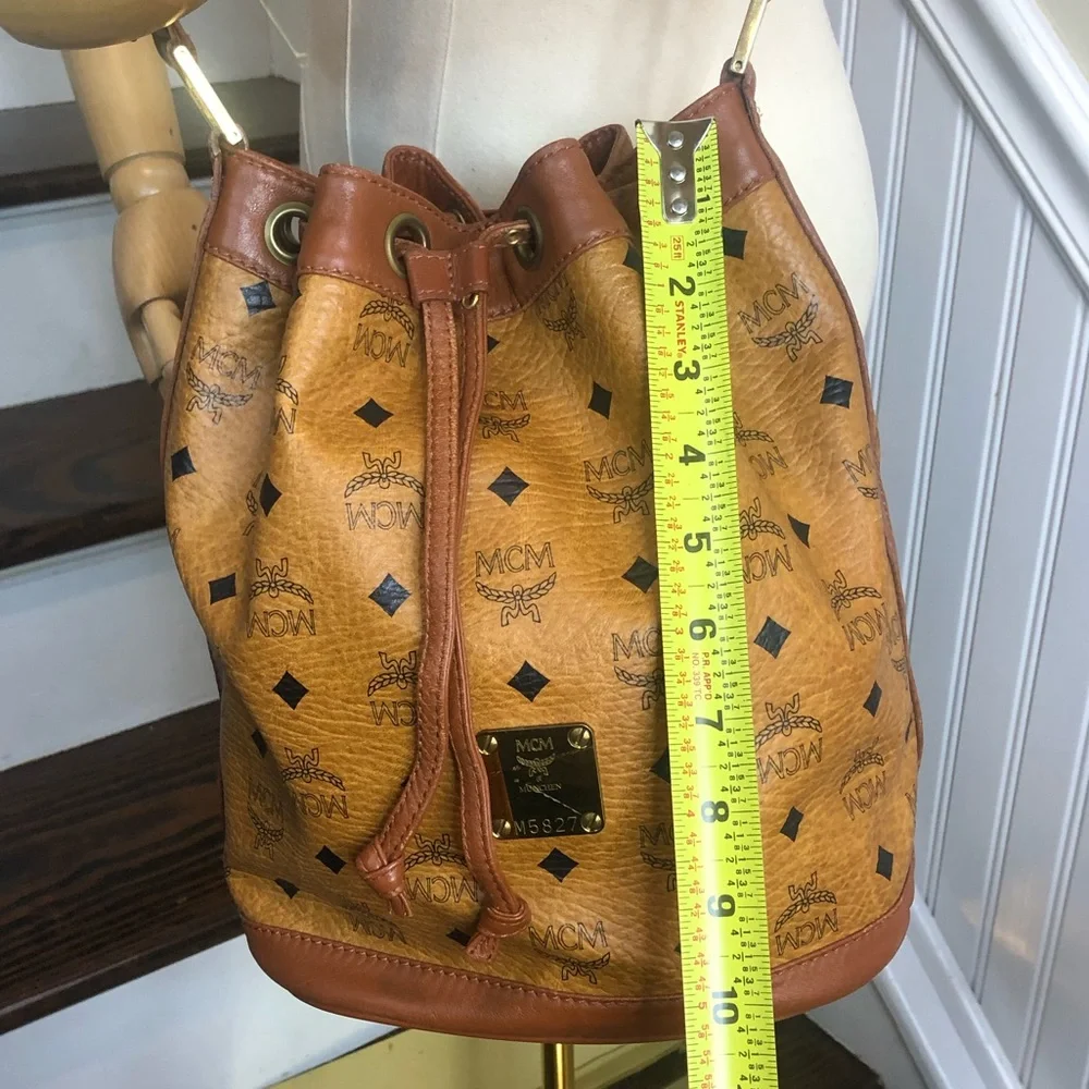 MCM Visetos Cognac Leather Monogram Bucket Drawstring Crossbody Bag EUC